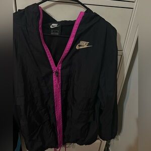 Black and pink windbreaker Nike jacket